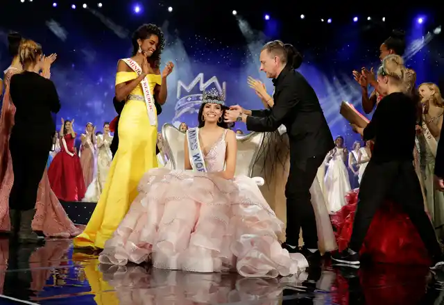 Stephanie Del Valle has her hair groomed after winning the competition. (Photo: Reuters)