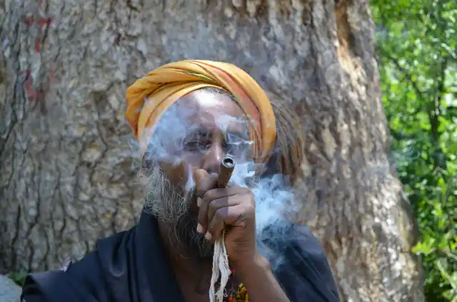 Sadhu smoking away to glory in Kheer Ganga. (Photo Courtesy: Prasoon Vashistha)
