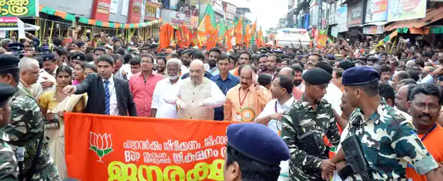 BJP chief Amit Shah participates in Janaraksha Yathra in Payyanur, Kannur on 3 October 2017.