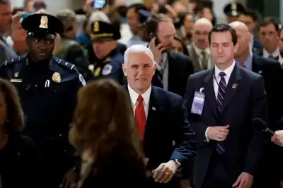 WASHINGTON, Dec. 19, 2017 (Xinhua) -- U.S. Vice President Mike Pence (C) is seen before a vote on the tax bill at the Capitol Hill in Washington D.C., the United States, on Dec. 19, 2017. The U.S. House of Representatives will have to vote again on the Republican tax bill on Wednesday as some provisions in the bill didn