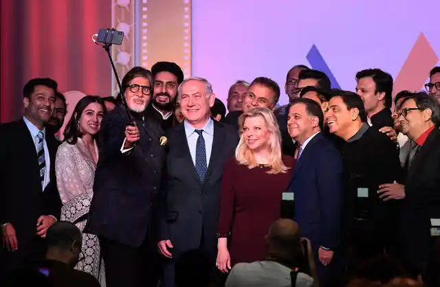 Israeli Prime Minister Benjamin Netanyahu takes a selfie with Bollywood personalities during ‘Shalom Bollywood’ on Thursday. 
