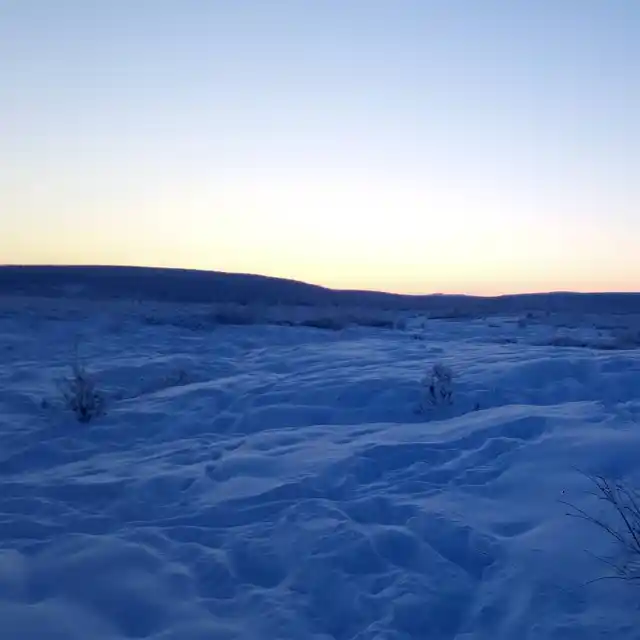 A bed of snow covers the region as mercury dips.