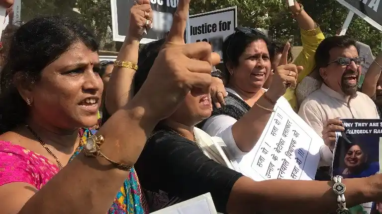 Image result for pics of rape protestor