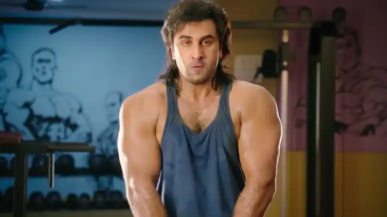 Ranbir Kapoor in and as <i>Sanju. </i>” data-reactid=”261″><figcaption class=