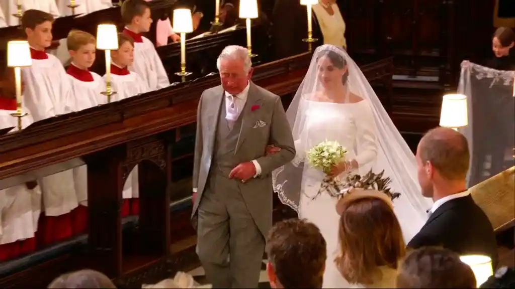 Meghan Markle walks down the aisle with Prince Charles for her wedding ceremony at St George’s Chapel in Windsor Castle in Windsor, near London, England, Saturday, 19 May, 2018.