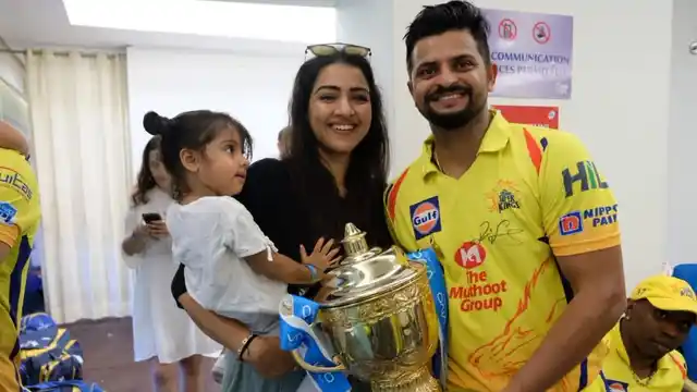 DJ Bravo photo-bombs the Raina’s perfect family moment.