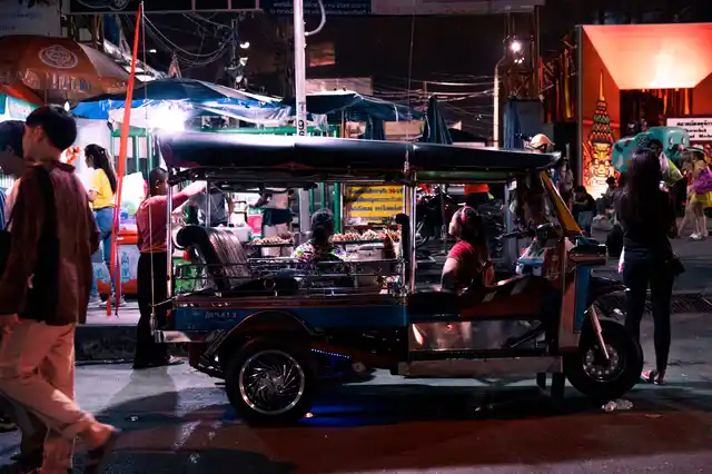 A tuk tuk is parked near the market area so that locals can avail it to carry their goods home. 