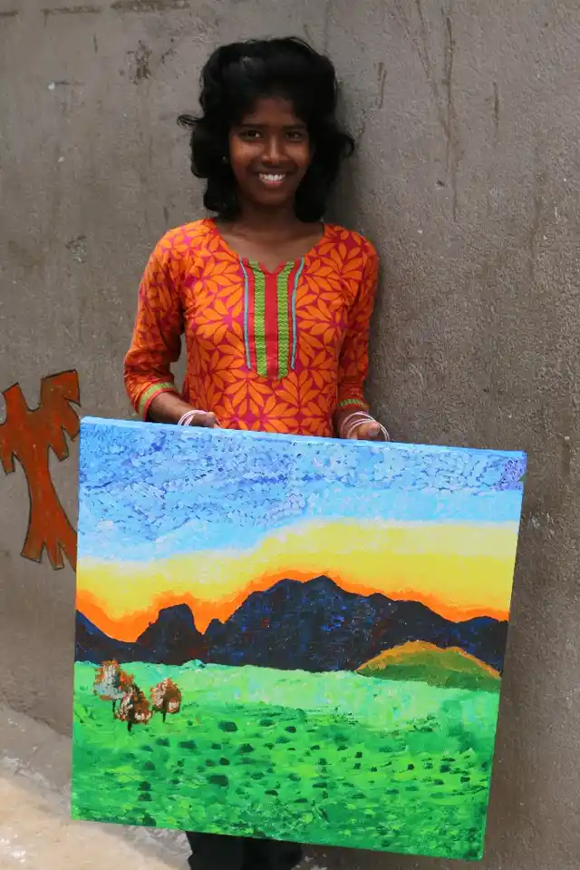 For many children, this was their first time painting, especially on a canvas.