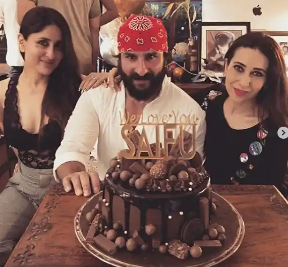 Saif Ali Khan poses with wife Kareena and sister-in-law Karisma Kapoor on his birthday.<i></i>