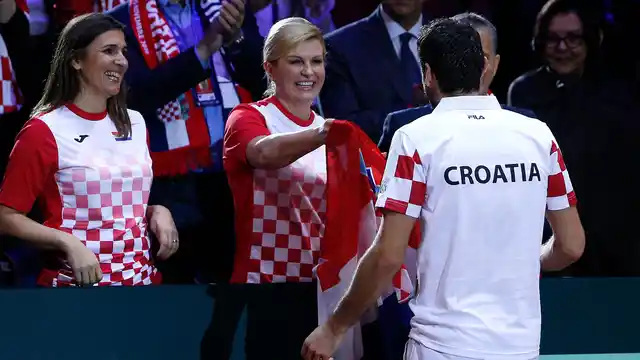 Croatia’s President Kolinda Grabar-Kitarovic hugs Croatia’s Marin Cilic after the Davis Cup final between France and Croatia on Sunday, November 25, 2018 in Lille.