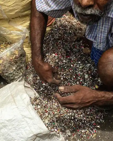 Stones and imitation jewellery being sorted to be reused at Zaveri Bazaar 