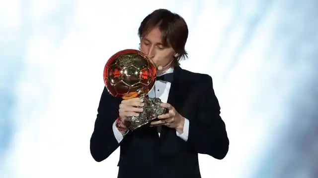 Real Madrid’s Luka Modric celebrates with the Ballon d’Or award during the Golden Ball award ceremony at the Grand Palais in Paris on Monday, 3 December 2018.