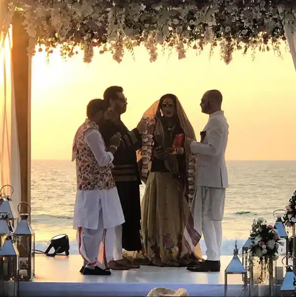 The celebration included a beautiful garland exchange.