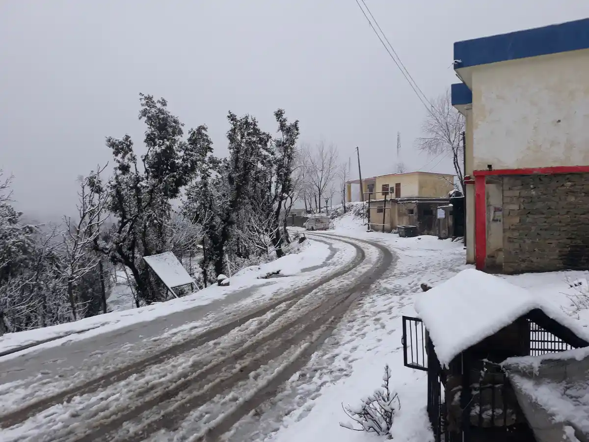 Layer of snow envelops the village. 