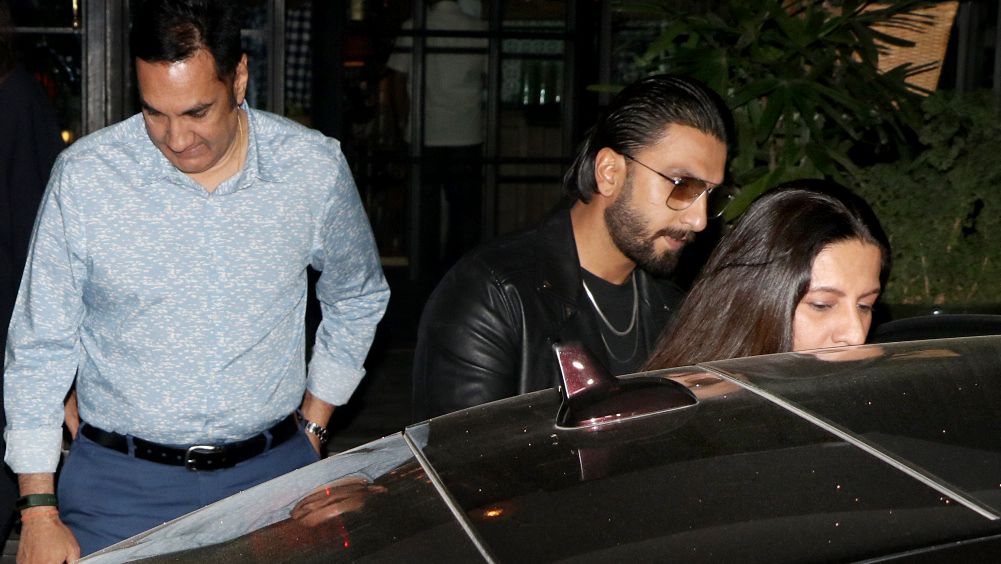 Ranveer Singh with his parents at a restaurant in Mumbai.