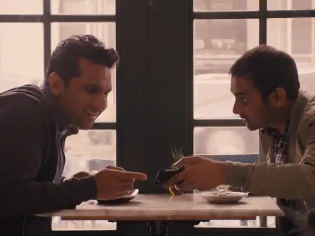 Ravi Patel and Aziz Ansari in <i>Master of None</i>’s ‘Indians on TV’ episode.” data-reactid=”295″><figcaption class=