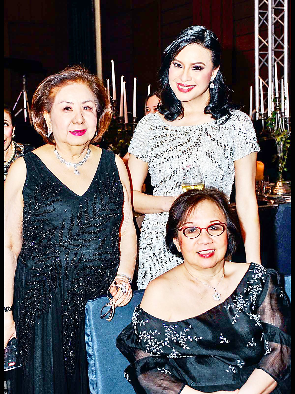 Fanny Blanco, Tiffany Cuña and Gracie Glory Go (seated).