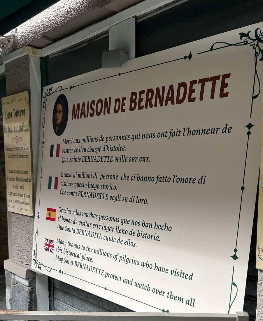 SIGNAGE at Bernadette’s birth house.