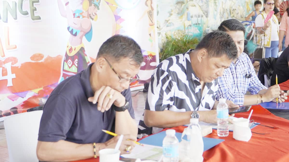 Board of judges scoring competitors of Mogpog Dance Festival 2024.