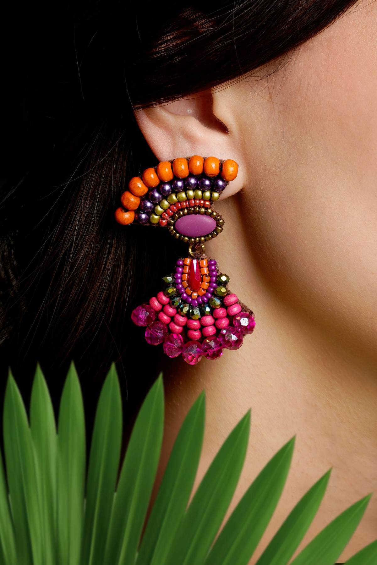 Bold and bright beaded dangling earrings.