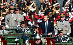 India fetes France's Macron at annual military parade