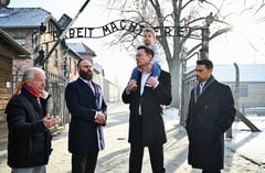 Musk visits Auschwitz and defends record on anti-Semitism
