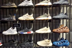 Adidas says it will unload Yeezy shoes without loss