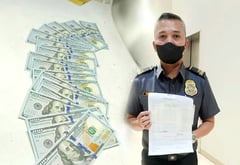 Honest airport officer turns over $2,000