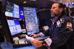Tech surge lifts S&P 500 to first-ever close above 5,000 points