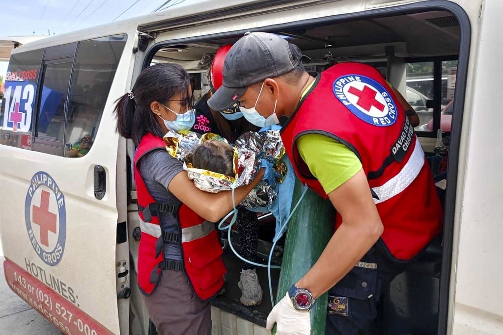 Quake halts search at Philippines landslide disaster site

