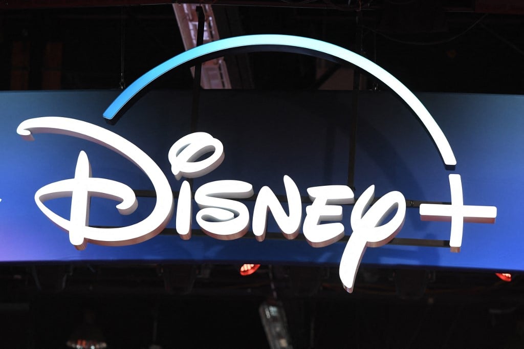 (FILES) A Disney+ streaming service sign is pictured at the D23 Expo, billed as the "largest Disney fan event in the world," on 23 August 2019 at the Anaheim Convention Center in Anaheim, California. 

Disney on 7 February 2024 reported higher than expected profit in the final three months of last year despite a slip in the number of subscribers to its streaming service.