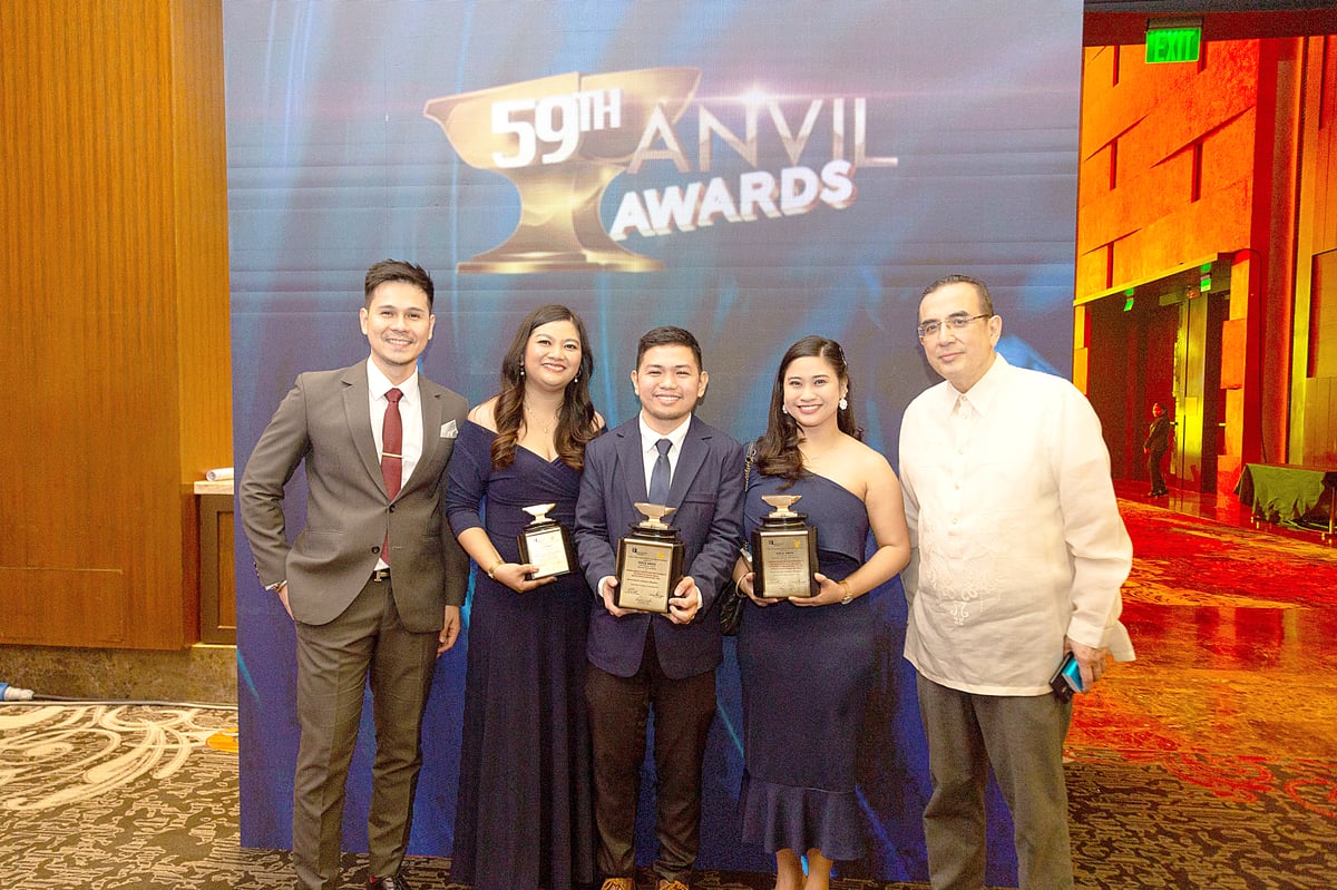 MERALCO TAKES HOME GOLD AND SILVER AT THE 59TH ANVIL AWARDS: Holding the trophies from left to right are Meralco Head of Talent Resourcing Ralph Lawrence S. Placido, Media Relations Specialist Arianne F. Merez, Talent Resourcing Employer Branding Partner Eduardo L. Hernandez, Jr., Assistant Vice President and Head of Public Relations Claire-Ann Marie C. Feliciano, and Vice President and Head of Corporate Communications Joe R. Zaldarriaga.