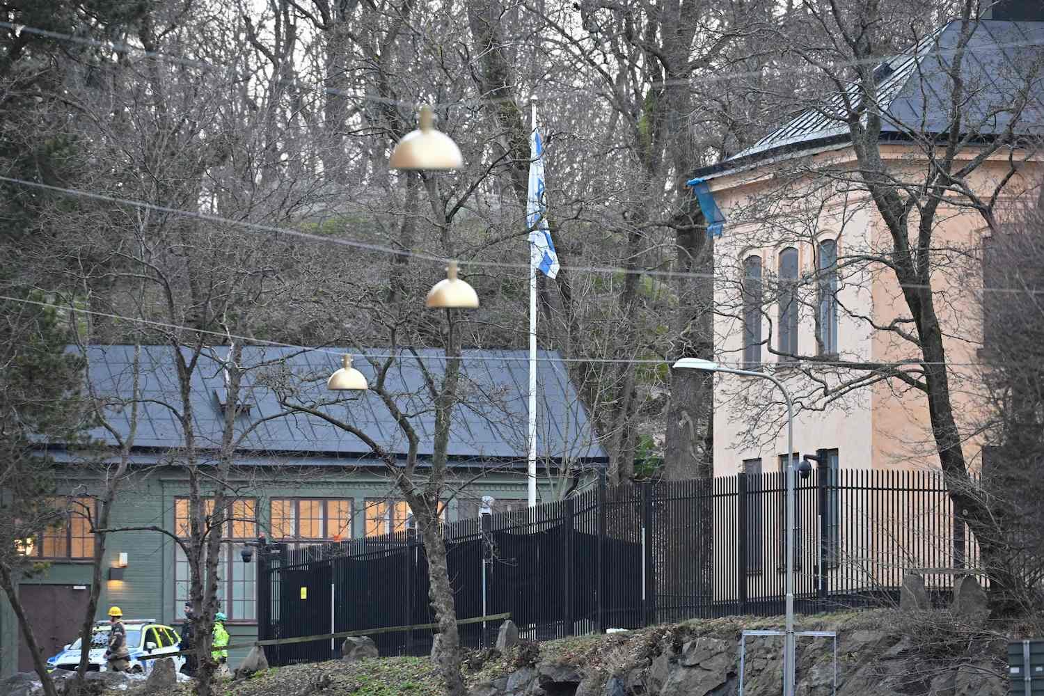 A police car is seen outside the Israeli embassy in Stockholm, January 31, 2024. A hand grenade was found near the Israeli embassy in Stockholm, Sweden on Wednesday, the explosive device was destroyed by the National Bomb Squad.