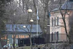 A police car is seen outside the Israeli embassy in Stockholm, January 31, 2024. A hand grenade was found near the Israeli embassy in Stockholm, Sweden on Wednesday, the explosive device was destroyed by the National Bomb Squad.