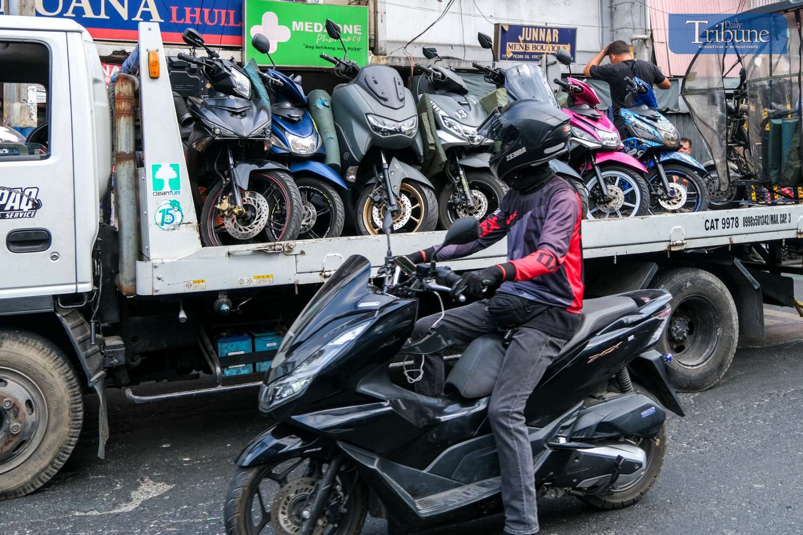 Motorcycles towed in Manila
