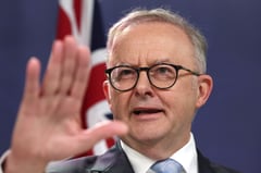 Australia tells China of 'outrage' over writer's suspended death sentence