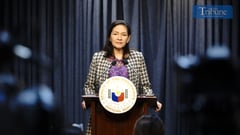 Senator Risa speaks before the press