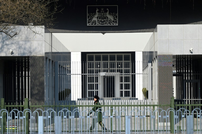 Australia expresses 'outrage' to China over writer's suspended death sentence