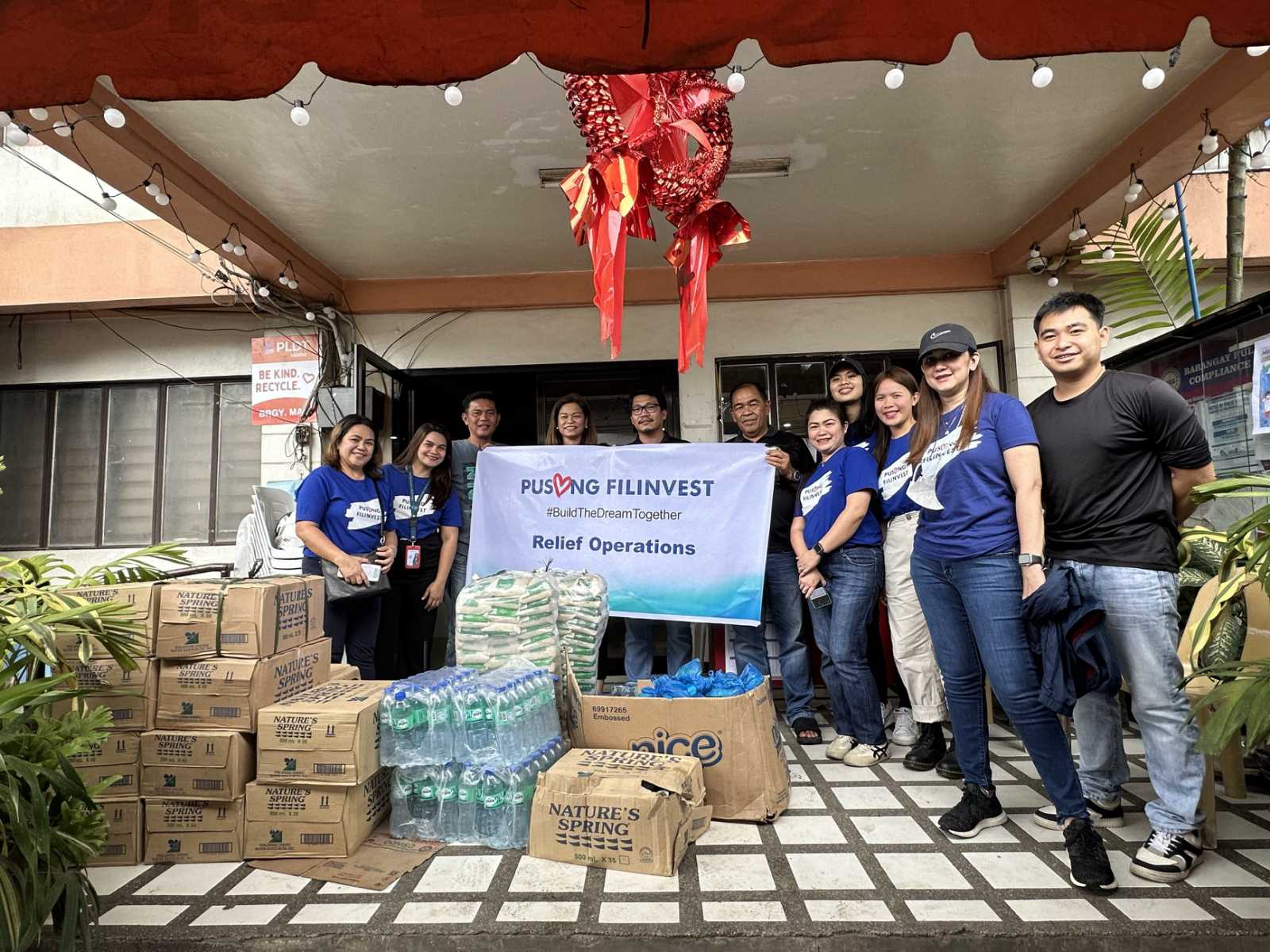 Filinvest Land Inc’s 8 Spatial Team First to extend aid to flood-affected families in Davao