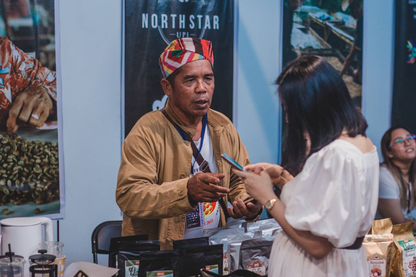 Coffee farmer shares his farm’s online pages to festival-goers interested in his Qahwa Sug
coffee from Sulu, Mindanao.