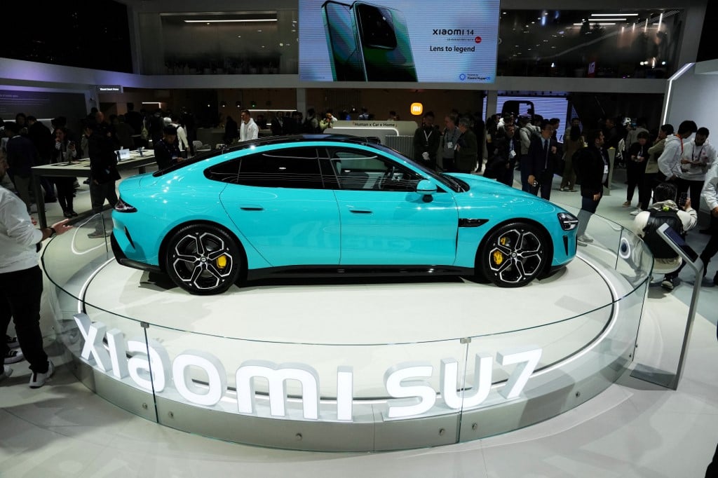 Xiaomi announces release date for first EV, shares surge