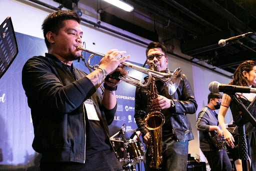 Musicians from Project 201, including saxophonist Mike Guevarra, at the 2023's MCF
Performance Theatre presenting jazz music for festival-goers to enjoy.