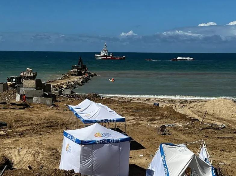 First aid boat unloads in Gaza; Hamas proposes new truce