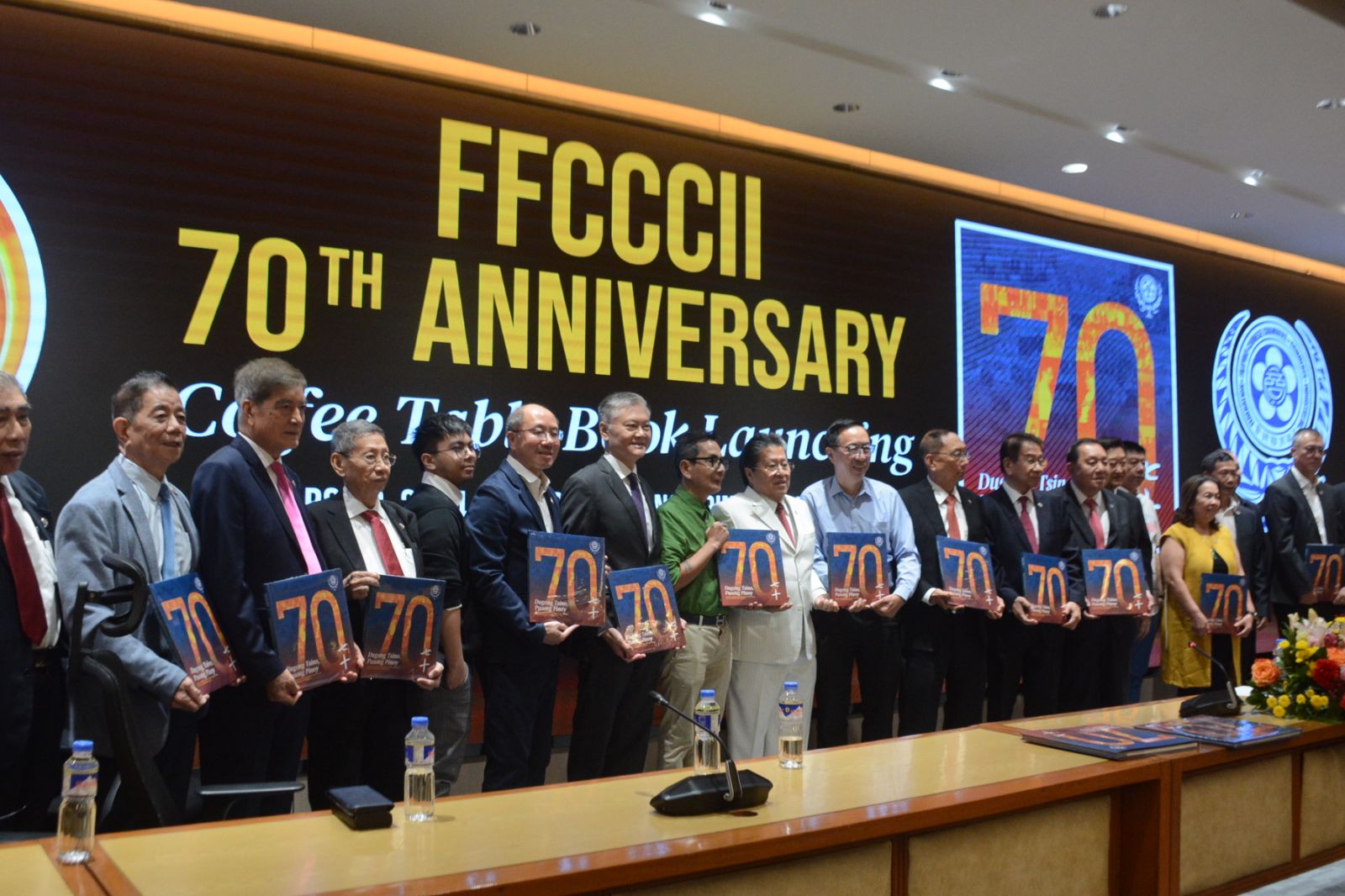 Current officials of the Federation of Filipino Chinese Chambers of Commerce and Industry hold a copy of the FFCCCII’s 70th Anniversary Coffee Table Book that was launched on Friday at the FFCCCII headquarters in Binondo, Manila.