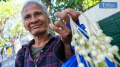 Badjao sells sampaguita