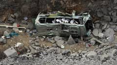 (FILES) The wreckage of a bus that plunged into a ravine killing 15 tourists and injuring another 19 others, near Jincheng city in Shanxi province on 26 February 2012.