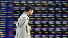 Tokyo shares close lower ahead of US data