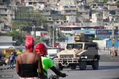 Police armed vehicles control the perimeter of the police station set on fire the previous day by armed gangs, in Port-au-Prince, Haiti, 6 March 2024. Haiti's capital was largely shut down with residents only venturing out for essentials,