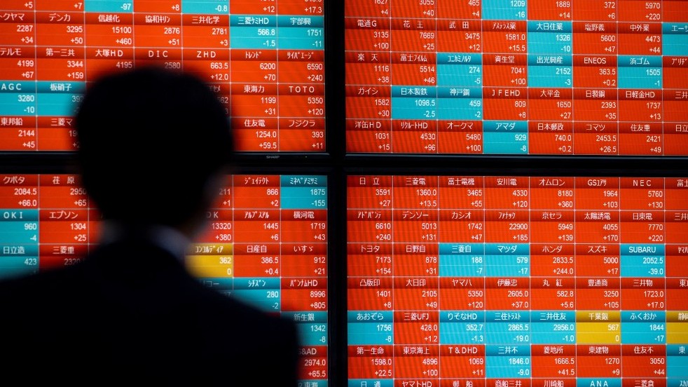 Asian markets mixed as traders eye US data, looming Fed meeting
