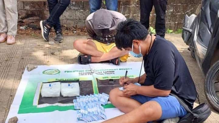 A member of the PDEA-BARMM conducts inventory on the seized illegal drugs worth P13.6 million in Indanan, Sulu.